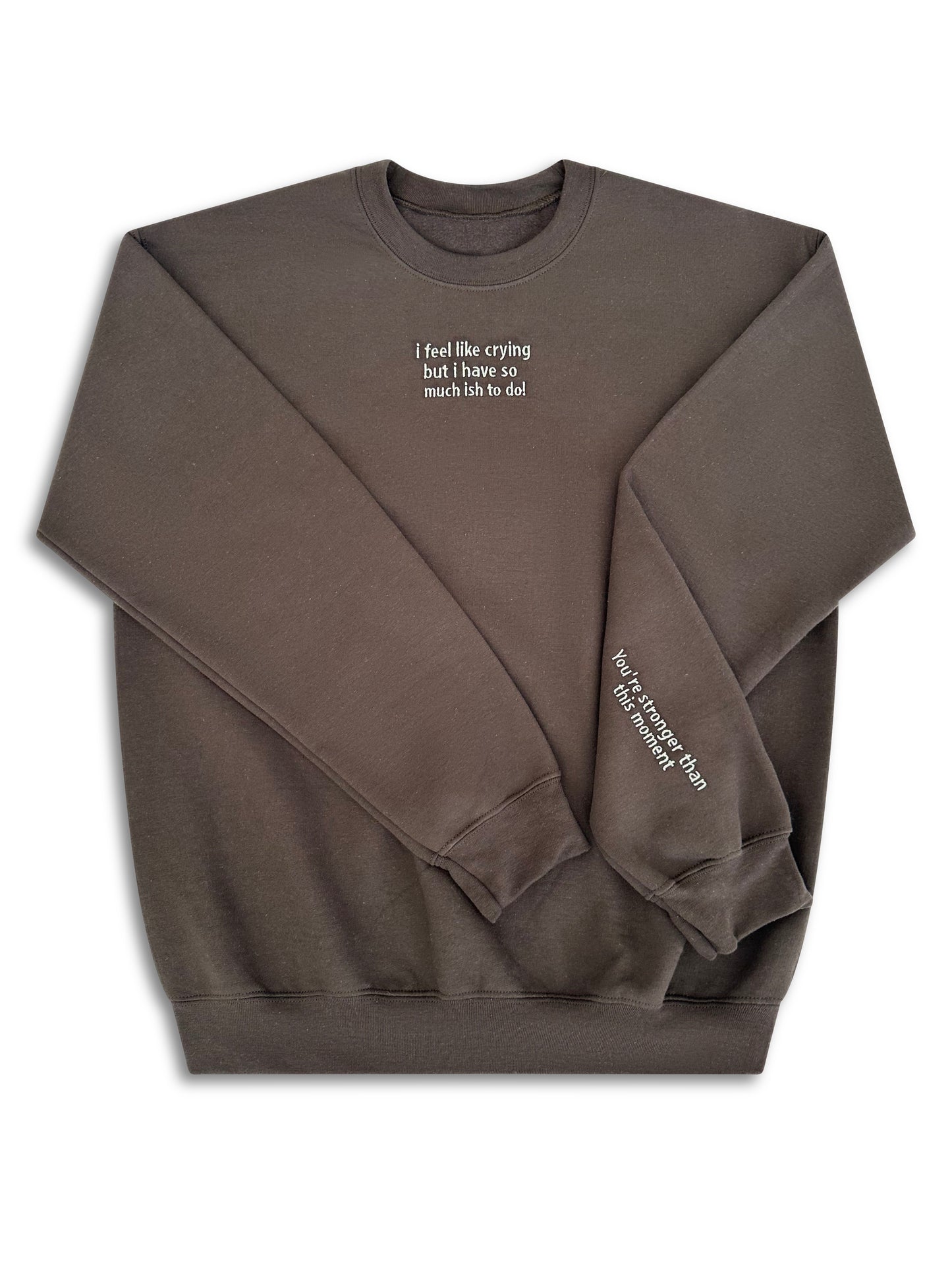 Brown sweatshirt with text on a white background. handcrafted embroidered apparel
cozy embroidered crewnecks
unique embroidered accessories
bookish embroidery designs
pet-themed embroidered tees
made-to-order embroidered gifts