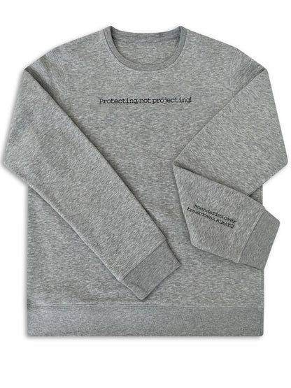 Gray sweatshirt with text on a white background. logo embroidery for businesses