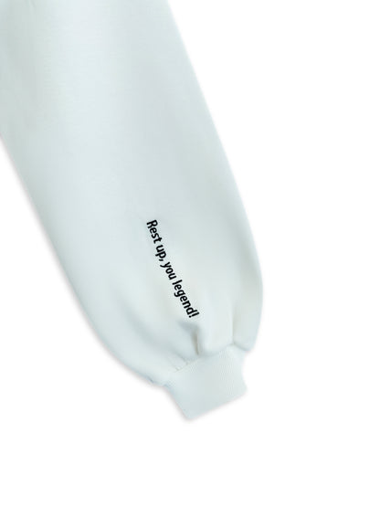 White sweatshirt sleeve with text 'Rest up, you legend!' on a white background. custom-branded embroidery
no minimum order embroidery
free logo setup apparel
personalized business embroidery
family-owned custom embroidery shop. Temu, shein