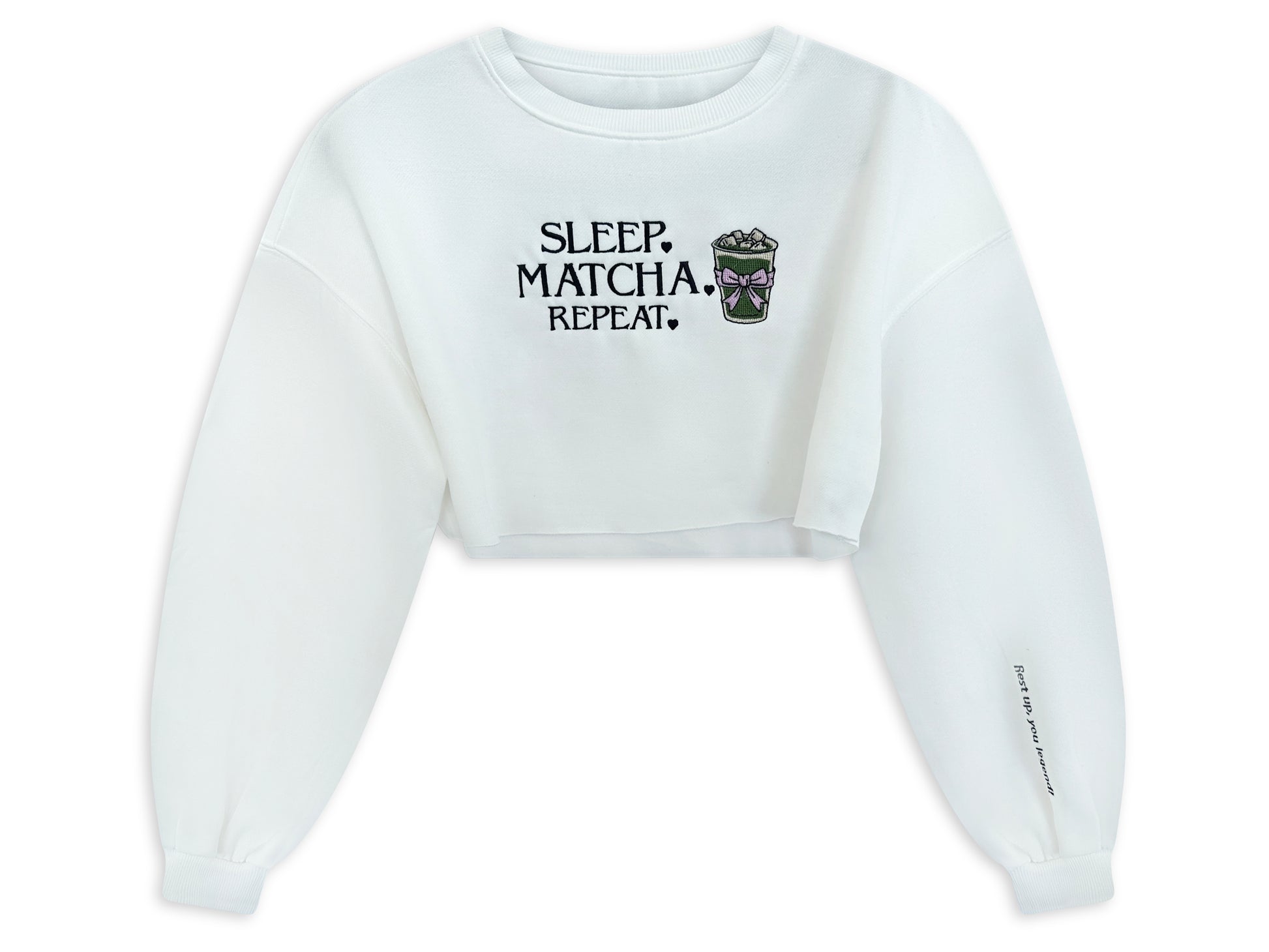 White cropped sweatshirt with 'Sleep. Matcha. Repeat.' text and graphic on a white background. custom-branded embroidery
no minimum order embroidery
free logo setup apparel
personalized business embroidery
family-owned custom embroidery shop