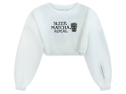 White cropped sweatshirt with 'Sleep. Matcha. Repeat.' text and graphic on a white background. custom-branded embroidery
no minimum order embroidery
free logo setup apparel
personalized business embroidery
family-owned custom embroidery shop
