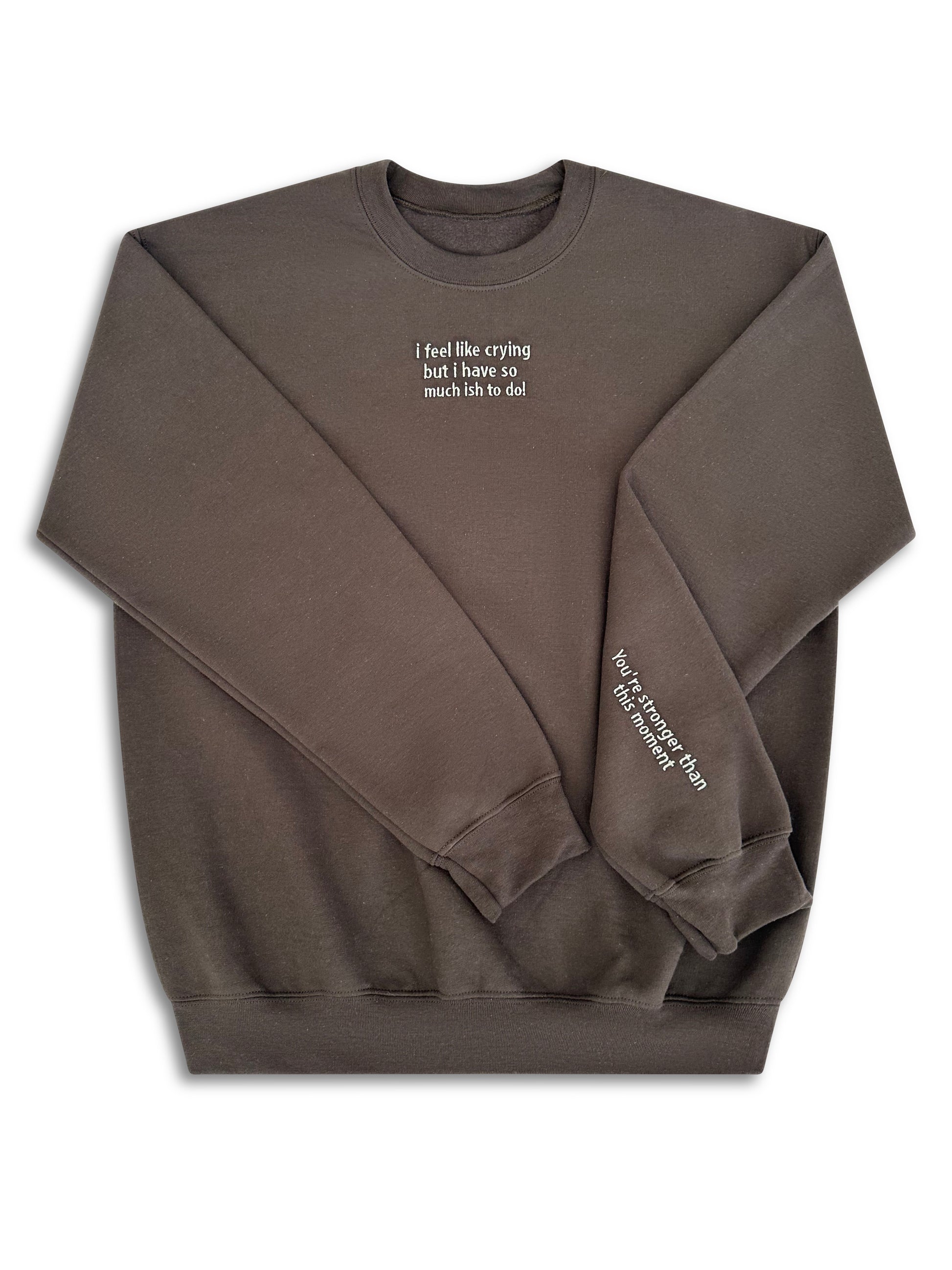 Brown sweatshirt with text on a white background. handcrafted embroidered apparel
cozy embroidered crewnecks
unique embroidered accessories
bookish embroidery designs
pet-themed embroidered tees
made-to-order embroidered gifts